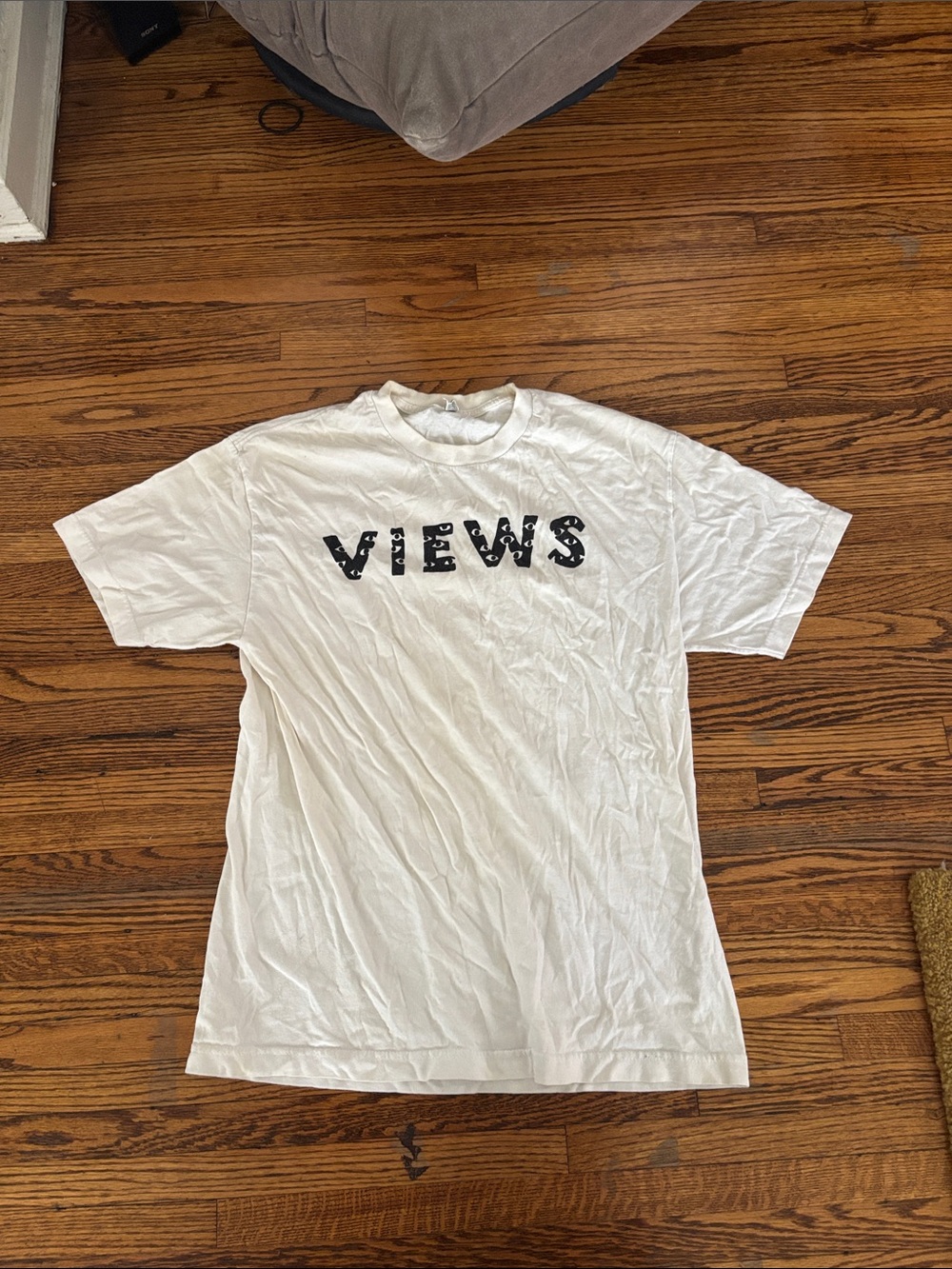 Classic White 'VIEWS' Short Sleeve Tee with Black Lettering